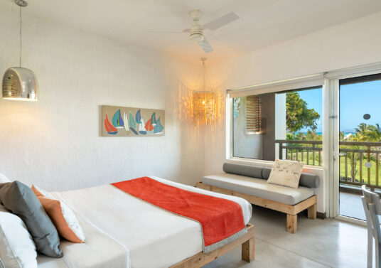 Internal view of couple deluxe room with partial sea view